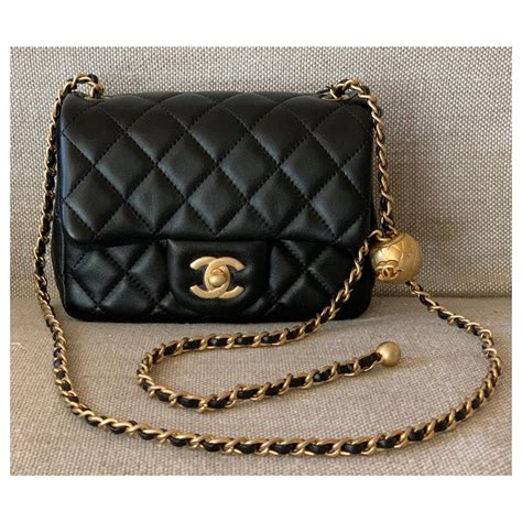 small black chanel purse with pearls|chanel mini bags.